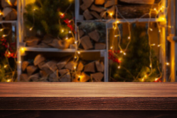 Wooden desk on christmas interior background, new year concept