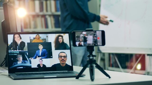 Laptop display showing multiple users during an online lesson