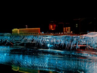 an abstract photograph of a wiring diagram frozen in ice like a night city