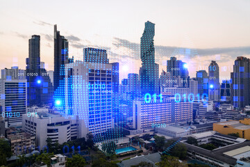 Fototapeta premium Glowing hologram of Earth planet map on aerial panoramic cityscape of Bangkok at sunset, Asia. The concept of international business. Multi Exposure.