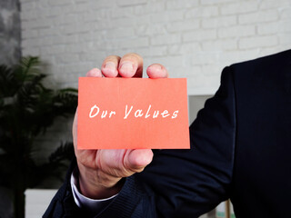 Business concept about Our Values k with phrase on the sheet.