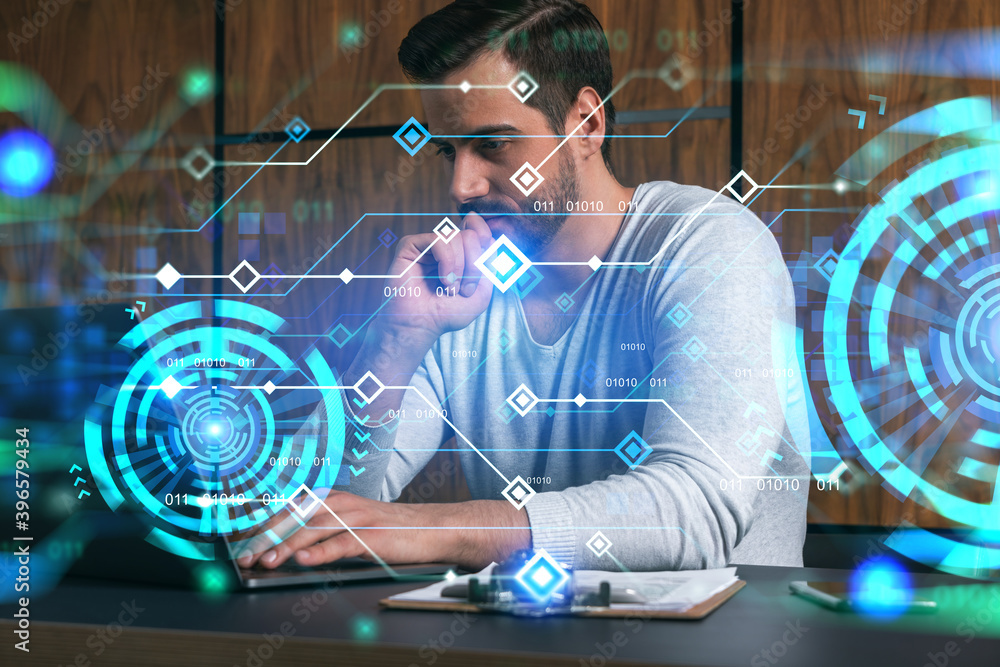 Poster a serious caucasian man in casual wears, typing laptop to create a new developers code for app. doub