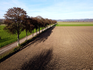 Aerial photos of a field in winter landscape on a sunny cold day