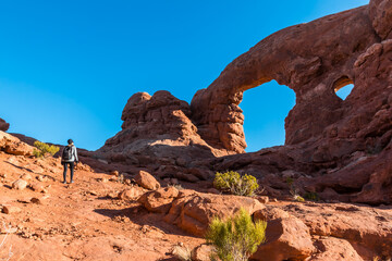 Female Hiker at Turret Arch, Arches National Park, Utah, USA © Billy McDonald