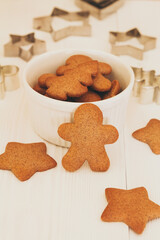 Christmas gingerbread cookies in a white bowl