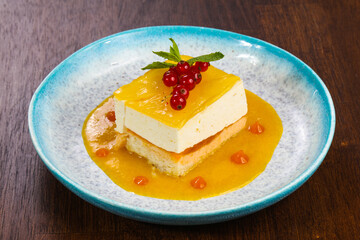 Traditional Cheesecake with orange sauce