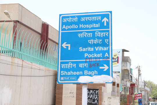  Road Direction  sign Board  This photo Shows the  blue  colour  direction board  for  Apollo  Hospital  ,Sarita Vihar Pocket A and  Shaheen bagh "