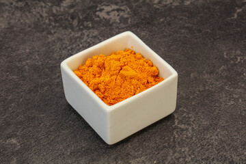Tumeric powder in the bowl