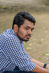 young guy look  at right slide with close up