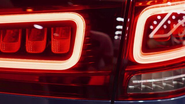 Close-up red led modern headlight car