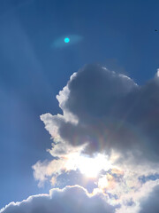 sun and moon in blue sky with clouds  fhuy1
