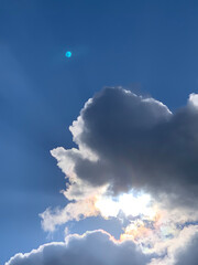 sun and moon in blue sky with clouds  fhuy1