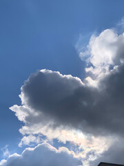 sun and moon in blue sky with clouds  fhuy1