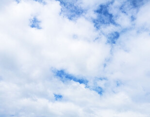 blue sky background with tiny clouds