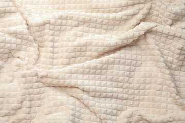 Soft warm white plaid as background, closeup