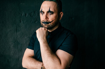 A portrait of gothic black clown