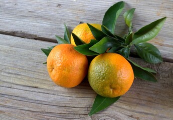 Fresh tangerines on a wooden table. Tangerines    background.