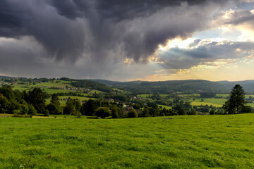 Dramatic stormy clouds over the Ardennes, near Malmedy, Belgium