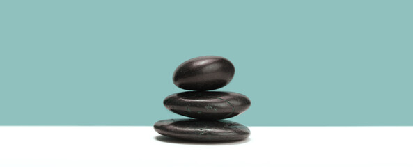 Stack of black stone. Horizontal background.