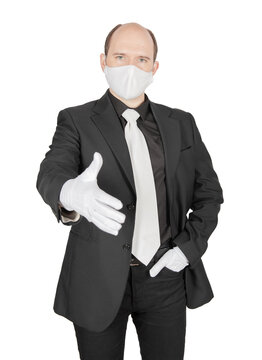 Handsome young business man with virus protection white mask offer hand in glove for handshake