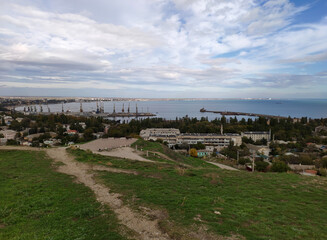 Obraz premium Crimean peninsula, the city of Feodosia. View from Mount Mitrtdat to the city and the Black Sea.