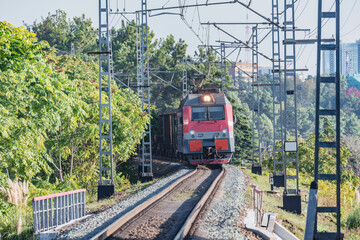 Plakat Freight train moves along Black sea coast. Sochi.