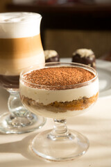 Tiramisu italian dessert on a cafe table