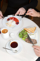 People eating breakfast in a cafe