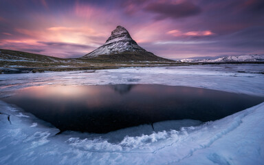 Sunset over Kirkjufell mountain, located in the western Iceland
