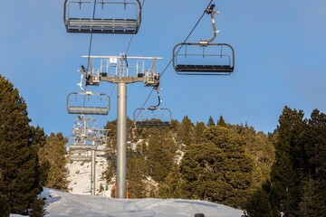 Ski lift at the Alps on the slopes