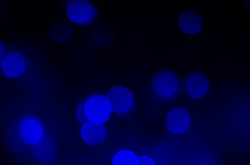 Abstract dark blue bokeh background