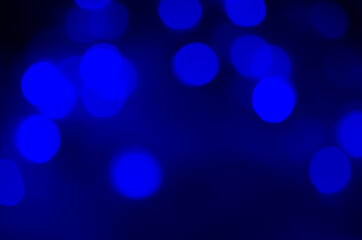 Abstract dark blue bokeh background