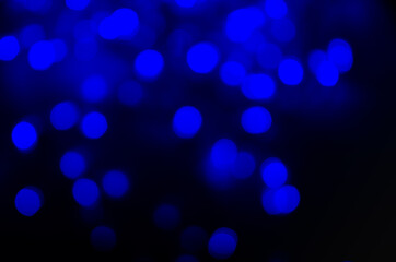 Abstract dark blue bokeh background