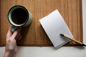 notebook and pen on the table