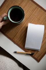 notebook and pen on the table