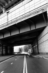 Fragment of the metro bridge, tunnel, monochrome.