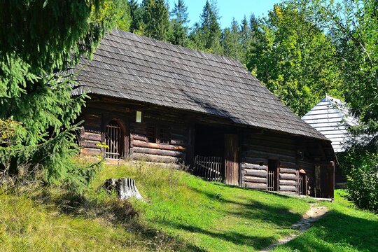 picture Historic wooden village buildings typical of the mountain environment in the past of the mountainous regions, Slovakia