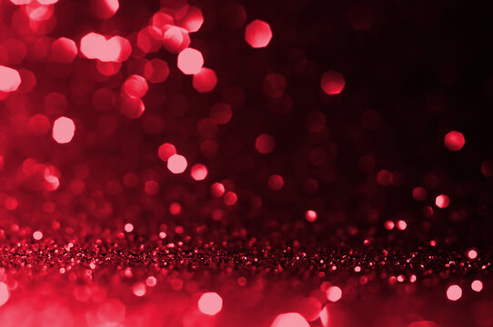 Dark red, maroon,black circle abstract light background, Abstract bokeh Red shining lights, sparkling glittering Christmas,new year lights backdrop. Blurred abstract holiday background.