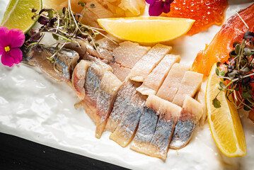 fish plate with lemon and caviar