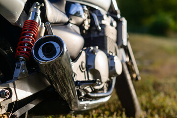 Close-up detail of a motorcycle, shot with selective focus.