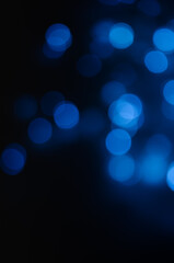 Abstract dark blue bokeh background