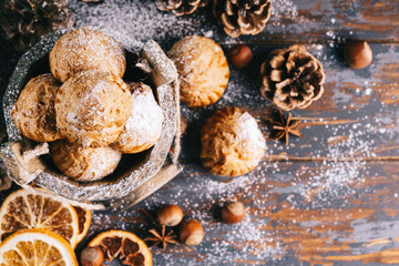 Sweet dessert profiteroles. Christmas composition. Christmas or New Year background.