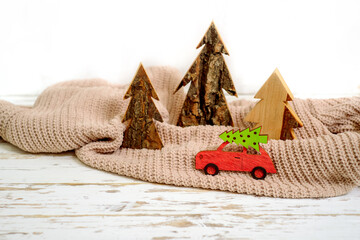 Christmas holiday concept with pine tree on toy car.