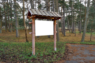 Information stand in the forest park. Place for inscriptions. Mock up.