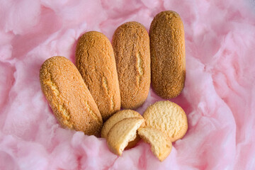 various sugar and wheat cookies with pink background