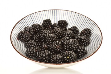 Organic blackberries, close-up, on a white background.