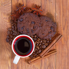image of coffee beans and cups with coffee on wooden table top view