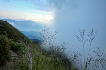 In selective focus a beautiful view of Doi Inthanon peak with fog on the sideway and mountains view ,Chiangmai,Thailand