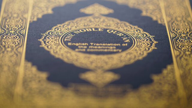 Quran cover with gold islamic pattern