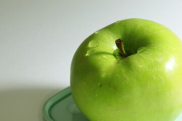 green apple on a white background
